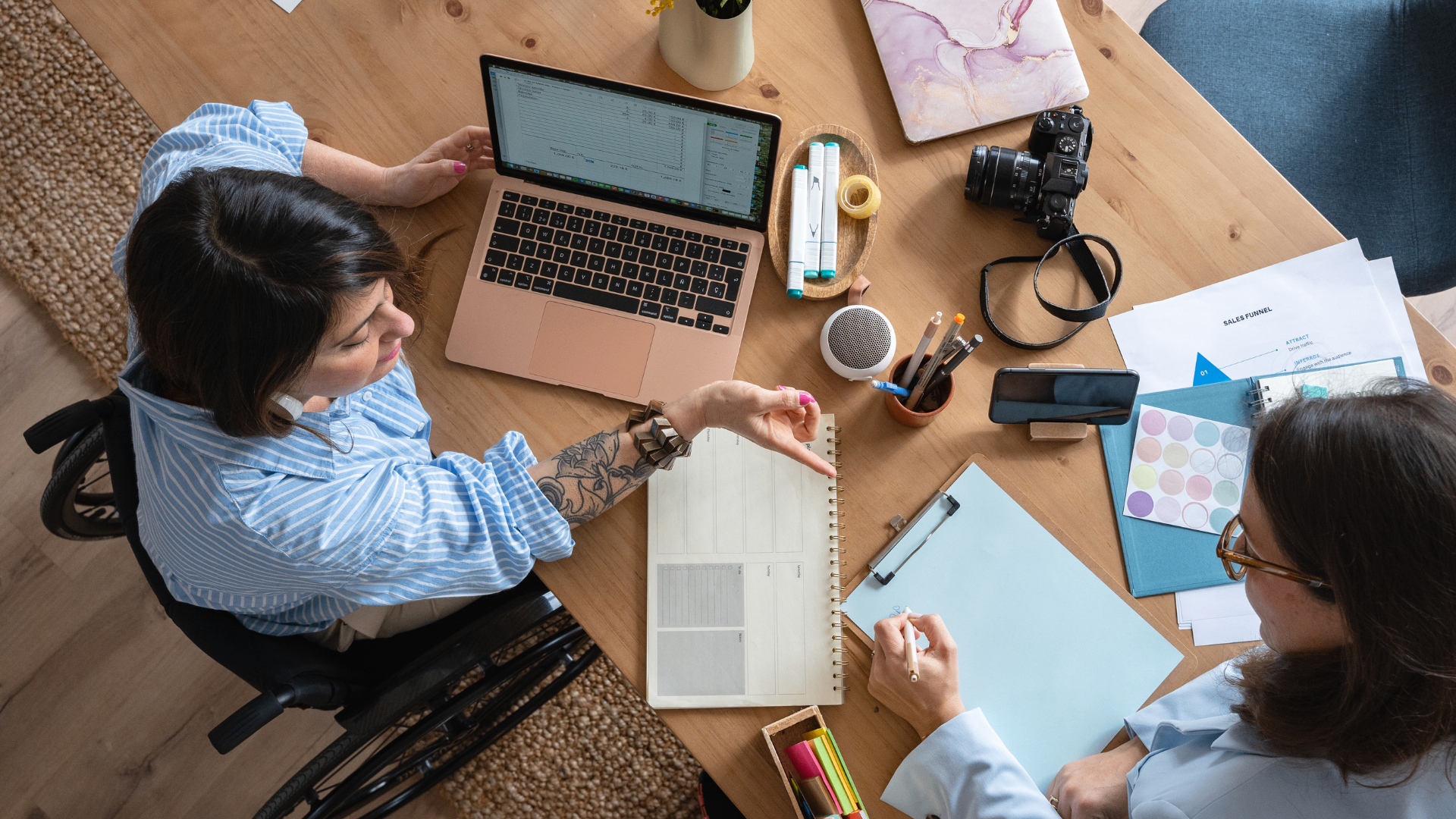Two people reviewing a personalized growth plan